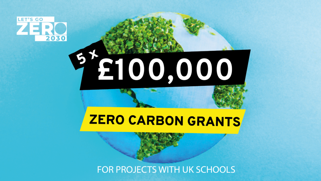 Blue asset with a globe. Written under is white with a black background '5 x £100,000' and underneath that 'Zero Carbon Grants' in black font. At the bottom of the asset in white font it says 'For projets with UK schools'
